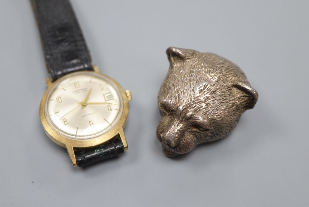 A silver pill box, cast as a tigress head import marks from London 1995 and an Ingersoll rolled gold wristwatch